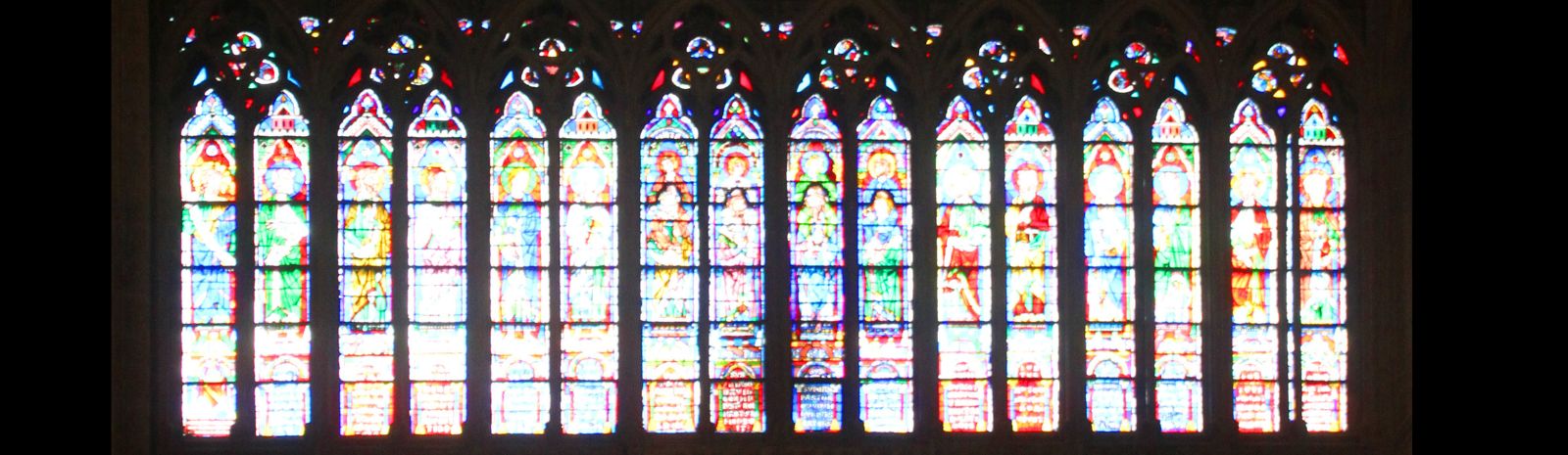An image of stained glass windows from the cathedral Notre-Dame de Paris.